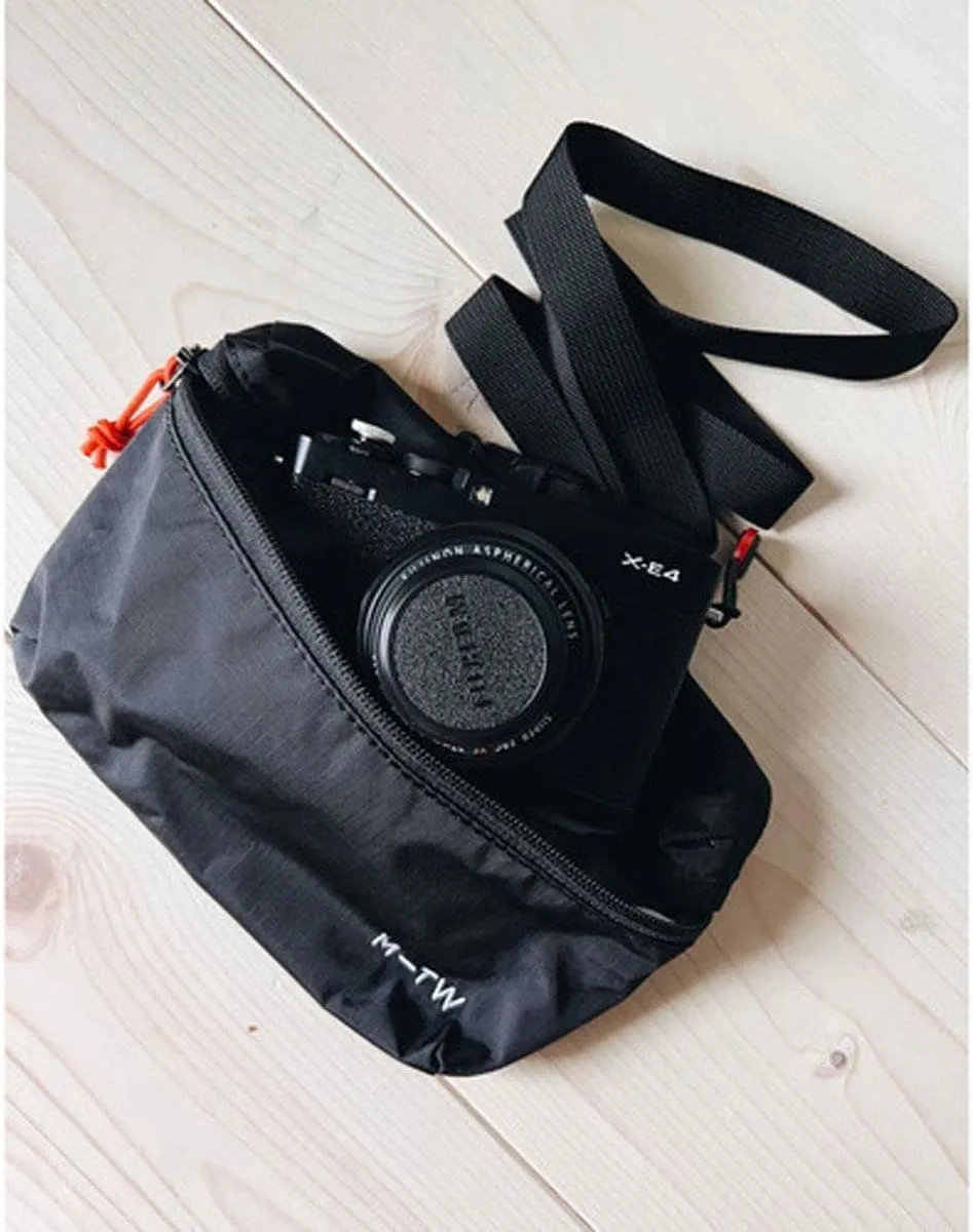 Moment Fanny Sling 1L  Classic Water-Resistant Travel Sling, Crossbody Bag for Essentials, Phone, Wallet & Everyday Carry (Black Ripstop)
